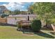 This home features a deck and fenced yard at 100 Charlotte Sw Dr, Mableton, GA 30126