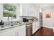 Galley kitchen with granite countertops, stainless steel appliances, and ample cabinet space at 100 Charlotte Sw Dr, Mableton, GA 30126