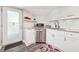Modern kitchenette features stainless steel appliances, granite countertops, and white cabinets at 100 Charlotte Sw Dr, Mableton, GA 30126