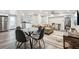 Open concept living area features a dining area, a living room and a modern kitchen at 100 Charlotte Sw Dr, Mableton, GA 30126