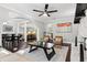 Bright living room with archway featuring a stone fireplace and modern furniture at 100 Charlotte Sw Dr, Mableton, GA 30126
