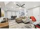 Spacious living room features modern furnishings, a dining area, and great light at 100 Charlotte Sw Dr, Mableton, GA 30126