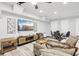 Inviting living room features comfortable seating, a large TV, and modern decor at 100 Charlotte Sw Dr, Mableton, GA 30126