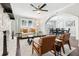 Bright living room featuring a stone fireplace and modern furniture at 100 Charlotte Sw Dr, Mableton, GA 30126