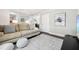 Spacious living room featuring neutral colors, modern decor, and plenty of natural light at 100 Charlotte Sw Dr, Mableton, GA 30126