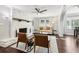 Bright living room featuring a stone fireplace and modern furniture at 100 Charlotte Sw Dr, Mableton, GA 30126