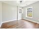 Inviting bedroom with hardwood floors and windows offering an airy, well lit feel at 1751 Carter Cir, Atlanta, GA 30344