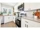Well-equipped kitchen with stainless steel appliances, sleek cabinetry, and modern countertops at 1751 Carter Cir, Atlanta, GA 30344