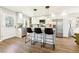 Modern kitchen featuring stainless steel appliances, a quartz island, and stylish bar stools at 1751 Carter Cir, Atlanta, GA 30344