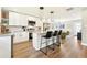 Spacious kitchen flows into the living area, with a large quartz island and stainless appliances at 1751 Carter Cir, Atlanta, GA 30344