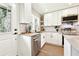 Updated kitchen with stainless steel dishwasher, a modern faucet, and stylish cabinetry at 1751 Carter Cir, Atlanta, GA 30344