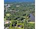 Spacious lot with mature trees near a large lake, as seen from above at 2962 Norman Cir, Duluth, GA 30096
