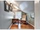 Attic room featuring a rocking chair, desk and wood floors at 2962 Norman Cir, Duluth, GA 30096