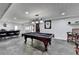 Finished basement featuring a billiard table, bar, and slate floors, perfect for entertaining at 2962 Norman Cir, Duluth, GA 30096