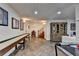 Spacious basement with slate floors featuring a shuffleboard table and ample space for activities at 2962 Norman Cir, Duluth, GA 30096