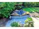 Aerial view of the detached two-car garage with an adjacent golf cart at 2962 Norman Cir, Duluth, GA 30096