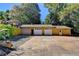 Detached two-car garage with two bays, plus additional storage or parking space at 2962 Norman Cir, Duluth, GA 30096