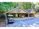 Detached garage featuring parking and work space, plus a golf cart at 2962 Norman Cir, Duluth, GA 30096