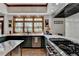 Gourmet kitchen featuring stainless steel appliances and designer cabinets at 2962 Norman Cir, Duluth, GA 30096