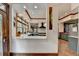 Open kitchen design with granite countertops, stainless sink, and breakfast bar at 2962 Norman Cir, Duluth, GA 30096