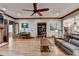 Living room features hardwood floors, custom bookshelf, and natural light at 2962 Norman Cir, Duluth, GA 30096