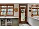 Mudroom with built-in cabinets, granite countertop and access to the outside at 2962 Norman Cir, Duluth, GA 30096
