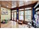 Playroom featuring hardwood floors, French doors, and multiple windows providing ample natural light at 2962 Norman Cir, Duluth, GA 30096