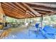 Covered porch with ample seating, providing a comfortable outdoor living space at 2962 Norman Cir, Duluth, GA 30096