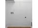 Walk-in closet with white walls, wire shelving, and wood flooring at 4457 Watson Ridge Dr, Stone Mountain, GA 30083