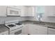 This kitchen features granite counters and appliances, enhancing its modern appeal at 4457 Watson Ridge Dr, Stone Mountain, GA 30083