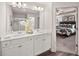 Bathroom featuring double vanity with white countertops and a view of the bedroom at 6324 Rosetta Drive, Lot 2, South Fulton, GA 30331