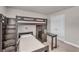 A contemporary style bedroom featuring a bunk bed with ample shelving and storage space at 1105 Alaska St, Hampton, GA 30228