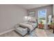 Cozy bedroom with natural light, stylish decor, and comfortable furnishings at 1105 Alaska St, Hampton, GA 30228