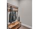 Mud room features an entryway bench with storage for coats, umbrellas, and shoes at 1105 Alaska St, Hampton, GA 30228