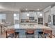 Modern kitchen featuring granite countertops, stainless steel appliances, a center island and ample cabinet space at 1105 Alaska St, Hampton, GA 30228