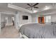 Comfortable main bedroom featuring neutral walls, carpet, and a mounted TV at 1105 Alaska St, Hampton, GA 30228
