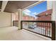Private balcony offering outdoor living space with wood floors and views of the neighborhood at 1276 Dahlgren Se Ln, Atlanta, GA 30316