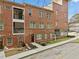 Attractive brick townhome boasts inviting curb appeal and a welcoming entrance, ideal for modern living at 1276 Dahlgren Se Ln, Atlanta, GA 30316
