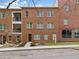 Brick townhome showcasing a blend of classic architecture and modern design with inviting landscaping at 1276 Dahlgren Se Ln, Atlanta, GA 30316