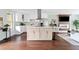 Stylish kitchen with stainless steel appliances, a modern island, and a decorative backsplash at 1276 Dahlgren Se Ln, Atlanta, GA 30316