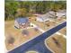 Aerial shot of a neighborhood featuring well-maintained homes and green spaces at 132 Windmeadow Way, Fayetteville, GA 30214