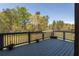 Large back deck that overlooks a scenic, wooded backyard at 132 Windmeadow Way, Fayetteville, GA 30214