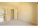 Neutral bedroom featuring a walk-in closet and neutral carpet at 132 Windmeadow Way, Fayetteville, GA 30214
