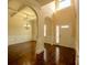 Elegant foyer with high ceilings, chandelier, and beautiful wood floors exudes a sense of luxury at 132 Windmeadow Way, Fayetteville, GA 30214