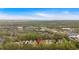 Aerial view of the neighborhood and surrounding area gives a sense of place at 2155 Westwind Dr, Roswell, GA 30075