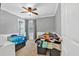 This is a roomy secondary bedroom that offers neutral walls and carpet, with room for two twin-sized beds at 2155 Westwind Dr, Roswell, GA 30075