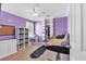 This bedroom is decorated with a fun, colorful scheme, perfect for relaxation or creating a personalized space at 2155 Westwind Dr, Roswell, GA 30075