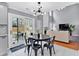 Inviting eat-in kitchen area with sliding glass doors to the patio and adjoining living space at 2155 Westwind Dr, Roswell, GA 30075