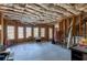 Unfinished basement space, open floor plan, wooden framework and insulation awaiting your finishing touches at 3053 Cambridge Hill Dr, Dacula, GA 30019