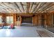 Unfinished basement with exposed framing, offering a customizable space with plenty of potential at 3053 Cambridge Hill Dr, Dacula, GA 30019